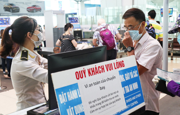 Vietnam mandates that people wear face masks at airports, bus stations, supermarkets amid COVID-19