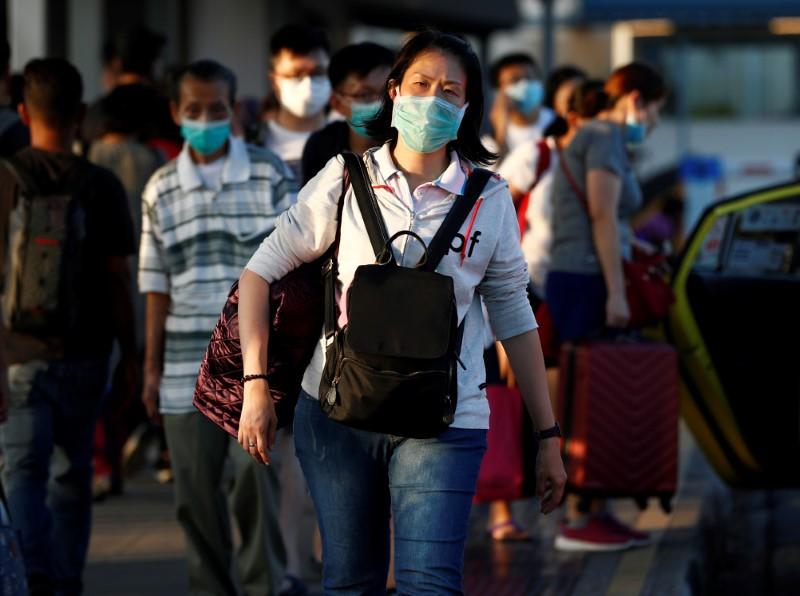 Singapore to ban on all short-term visitors in new virus measures