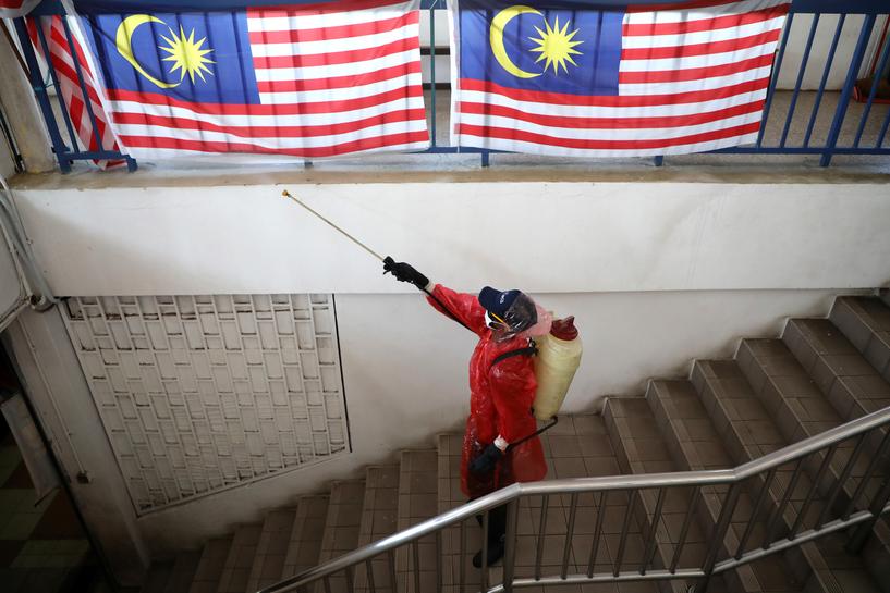 Malaysia extends movement curbs, prepares economic stimulus as coronavirus cases surge