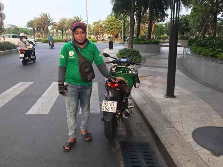GrabBike driver saves woman from jumping off bridge