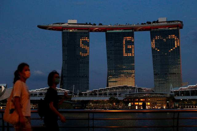 Singapore cuts 2020 GDP outlook again as virus batters economy