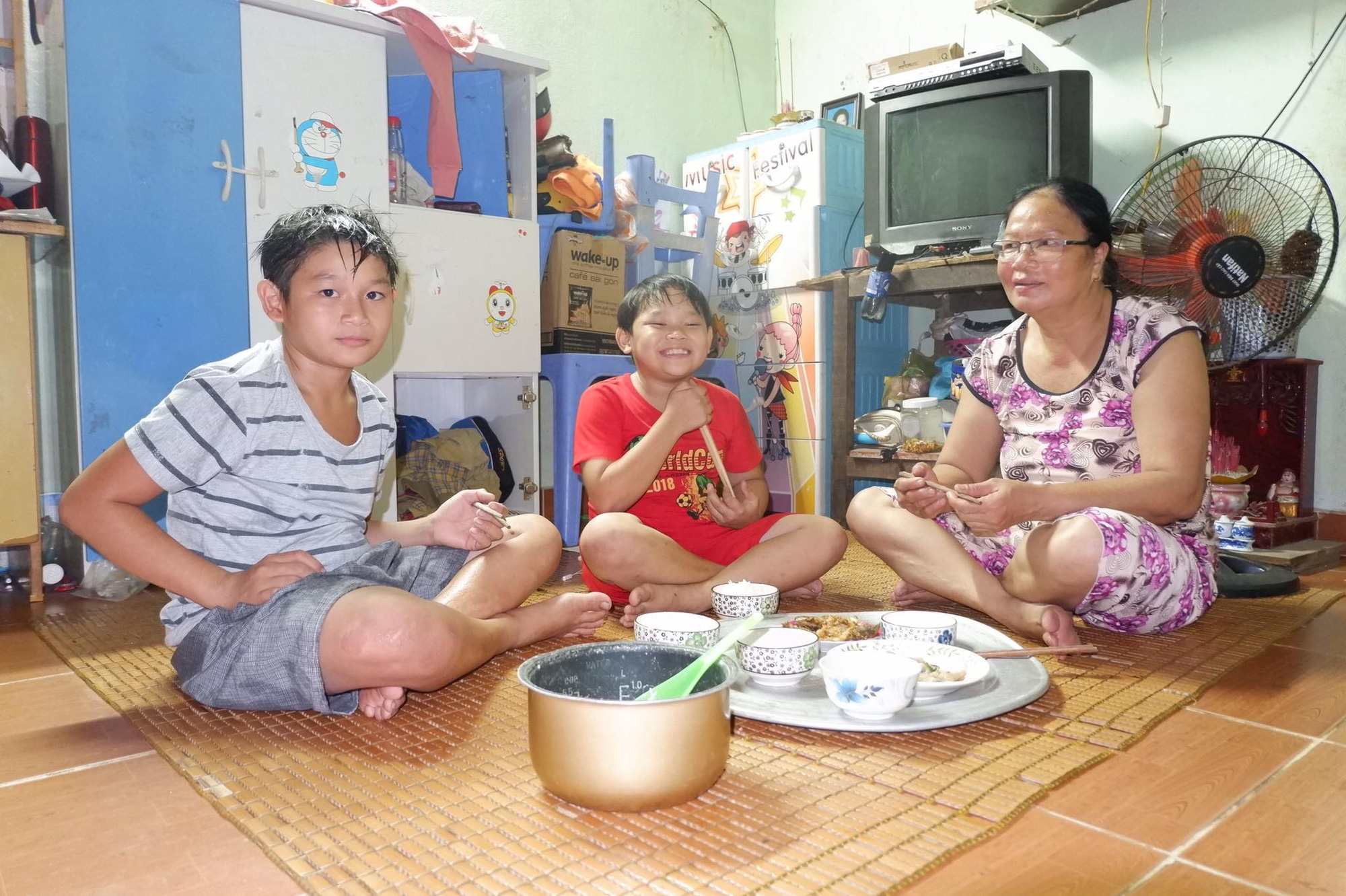 Vietnamese woman gives unconditional love to adopted sons