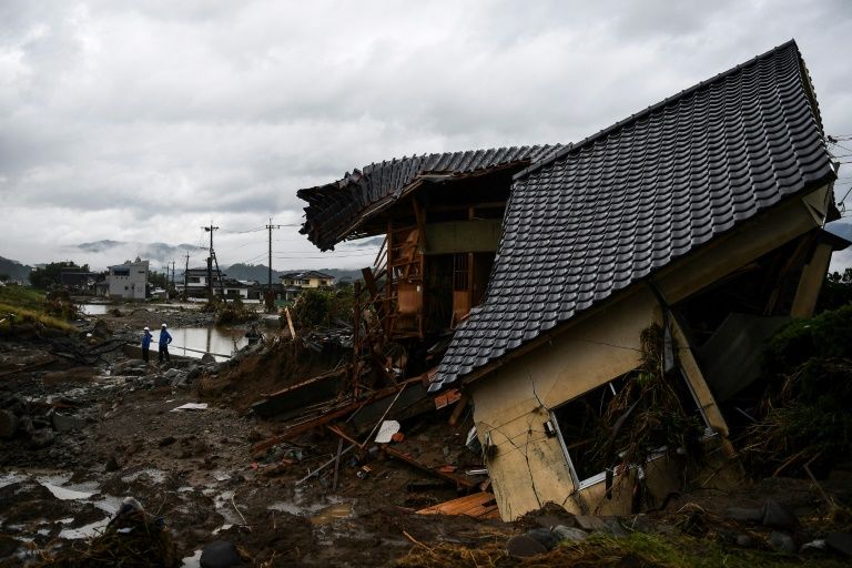 Rain pounds central Japan, 55 feared dead in south
