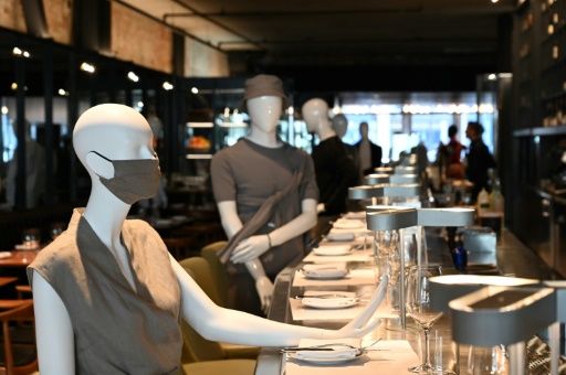 Mannequins do double duty in a chic restaurant in virus-hit Montreal