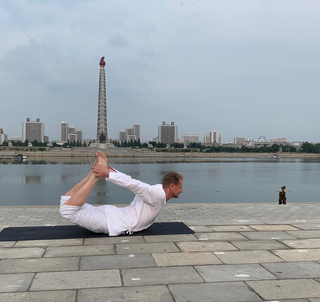 Handstands in North Korea: Swedish ambassador takes yoga to streets amid coronavirus lockdown