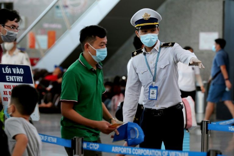 Vietnam curbs movement in city of 1.1m as virus-free run ends
