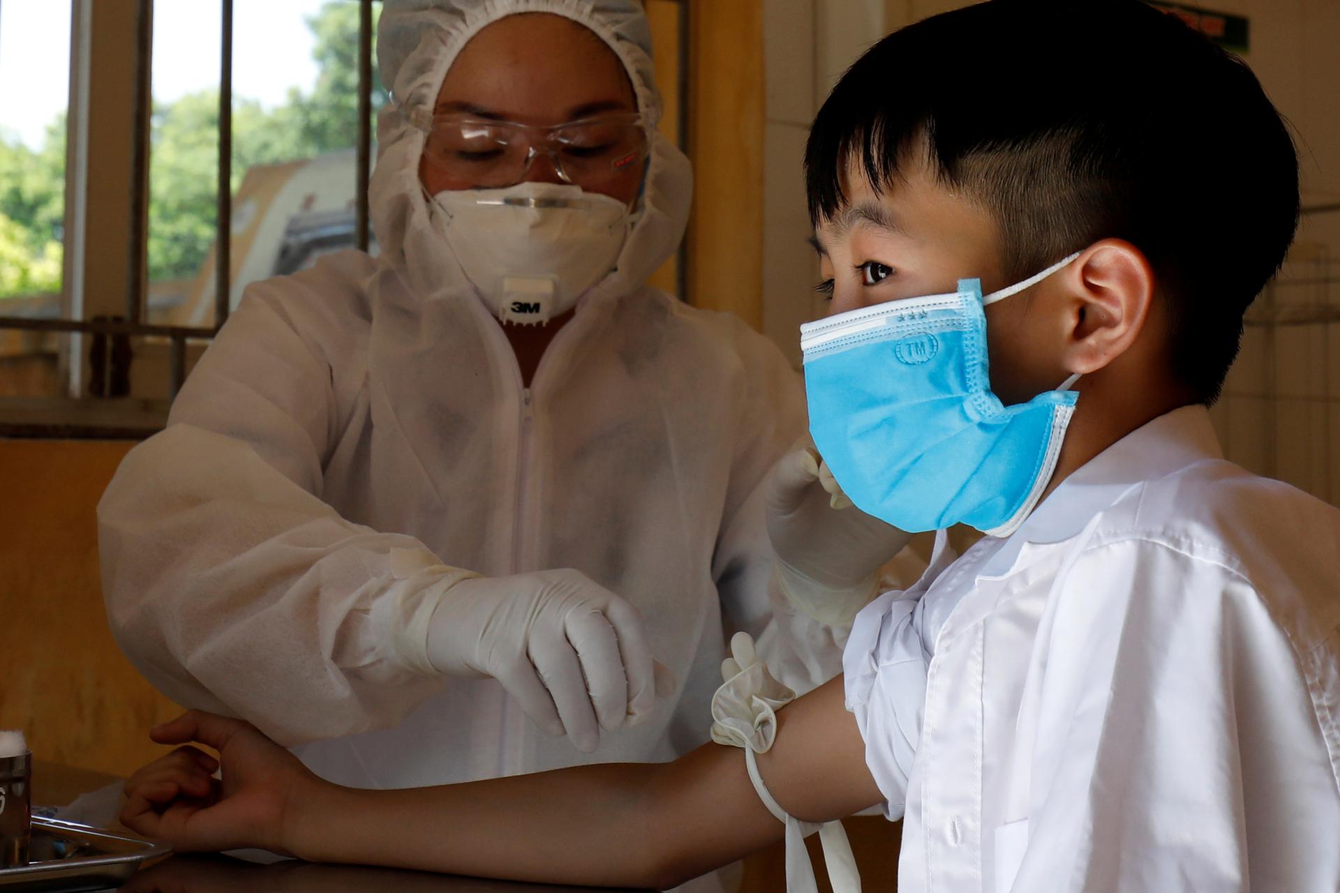 Vietnam reports biggest jump in COVID-19 cases, mobilises health team