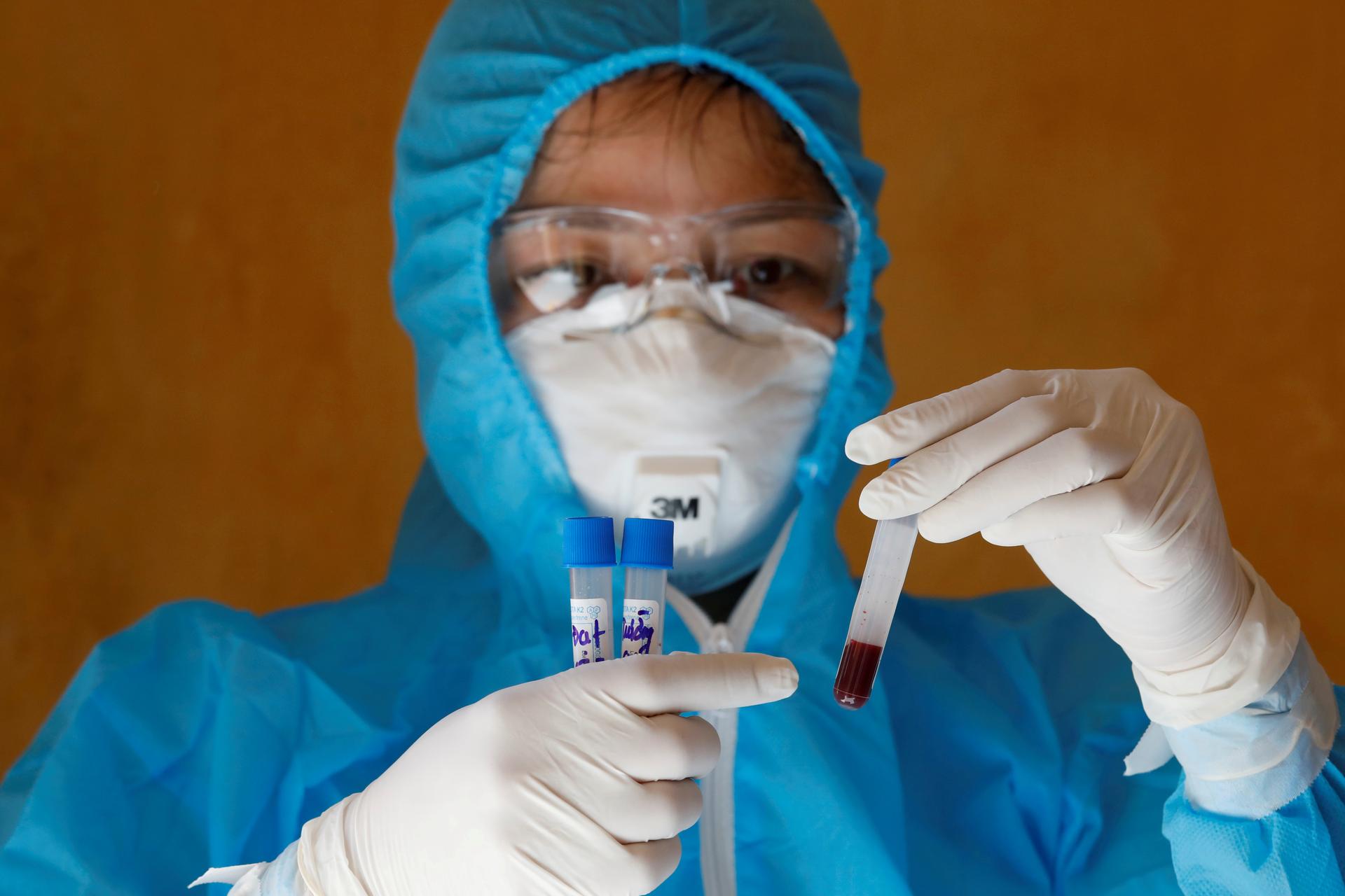 Vietnam says origin of Da Nang outbreak hard to track as virus cases rise