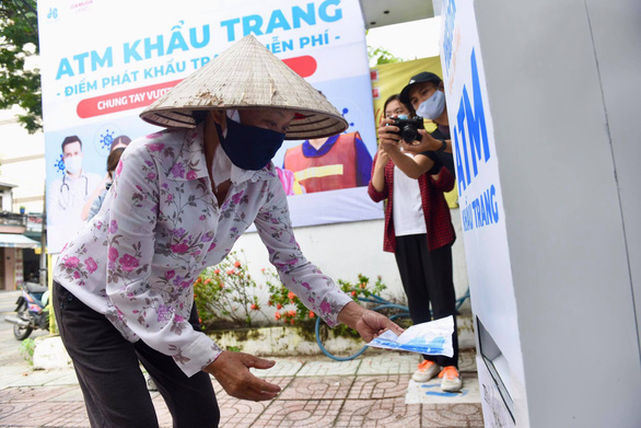 Man behind Vietnam’s viral ‘rice ATM’ launches free face mask dispenser