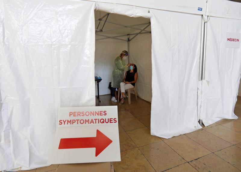France's daily COVID-19 cases pass 10,000 for first time