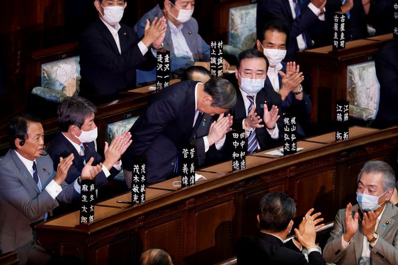 Japan's Suga crafts 'continuity cabinet' after voted prime minister