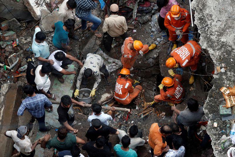 India building collapse death toll climbs to 20, second day search underway