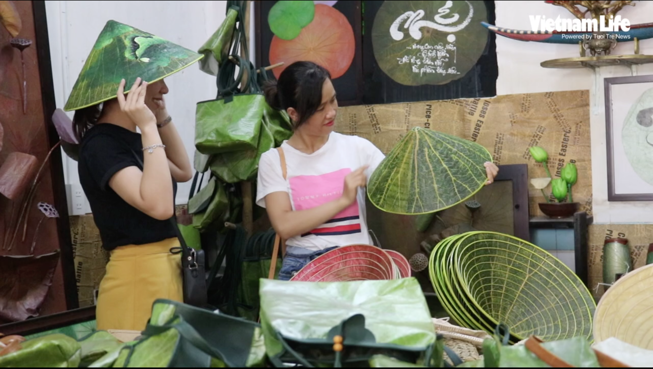 Vietnamese student makes conical hats from lotus leaves