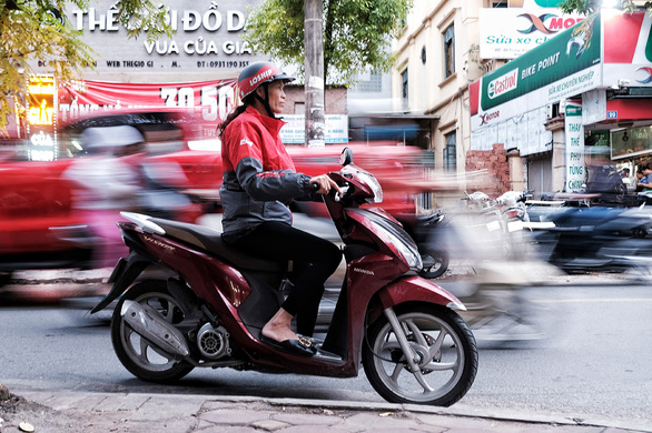 In Vietnam, women find arduous tech-based delivery job rewarding