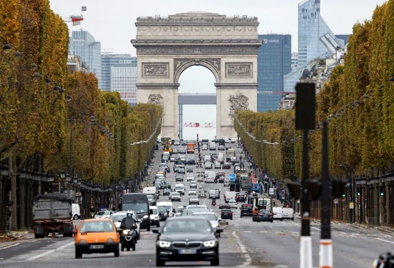 Europe and US pass virus milestones as France locks down