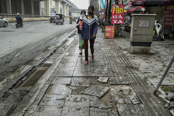 Hanoi sidewalks with projected 70-year lifespan crumble after 3 years in use