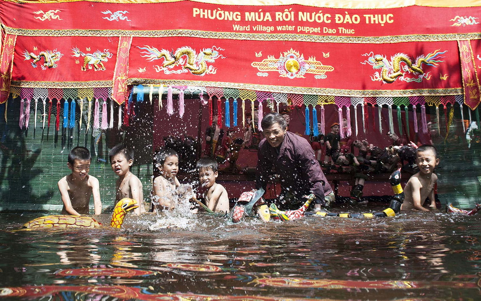 Check out this 300-year-old water puppetry village on the outskirts of Hanoi