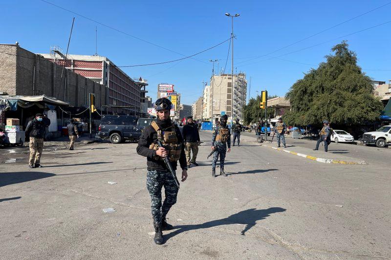 Rare twin suicide attack kills at least 13 in Baghdad