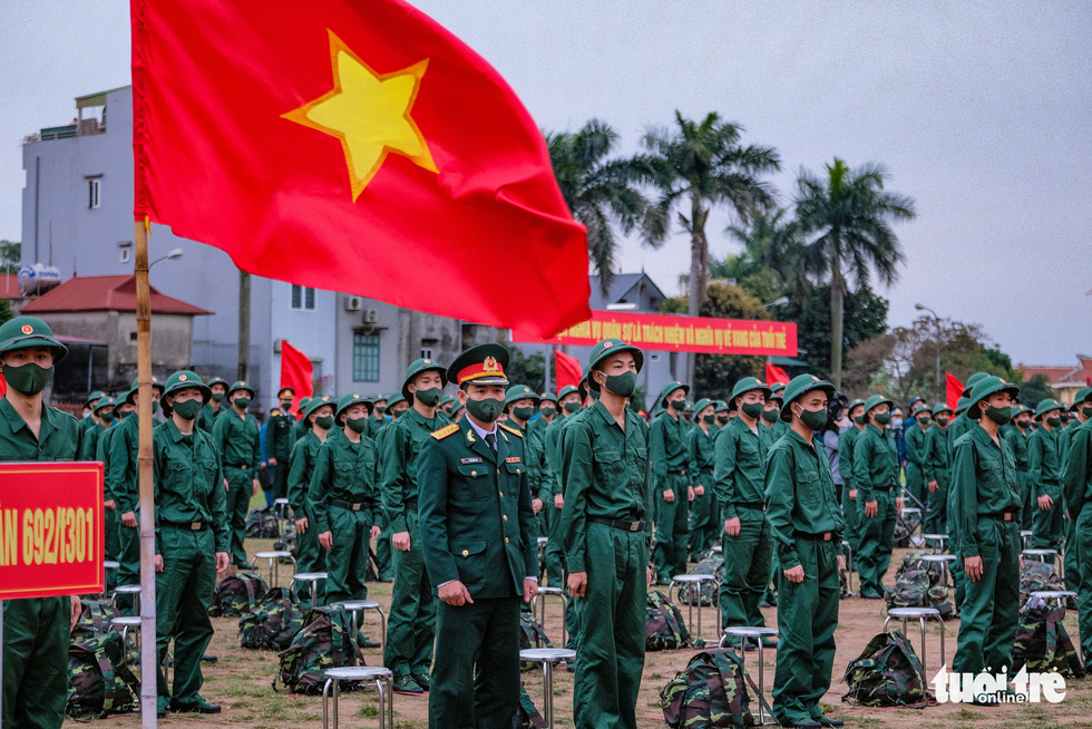 Hanoi youths join army in streamlined ceremony