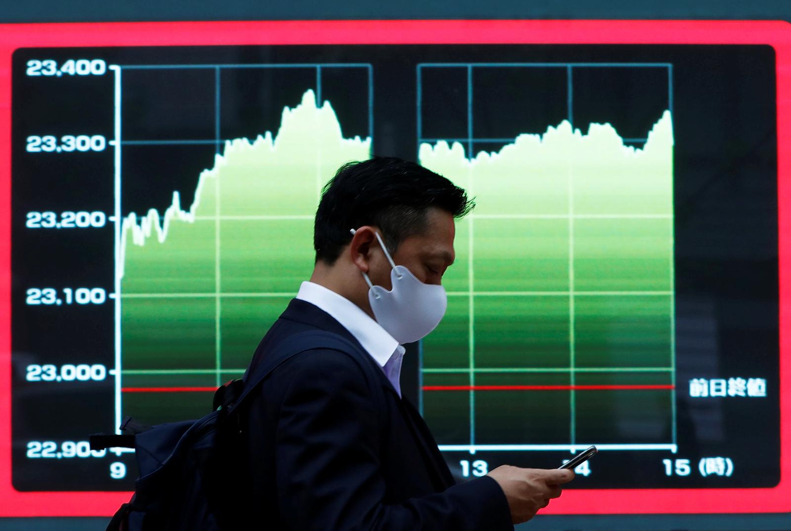 World stocks inch up on increasing bets on faster economic recovery