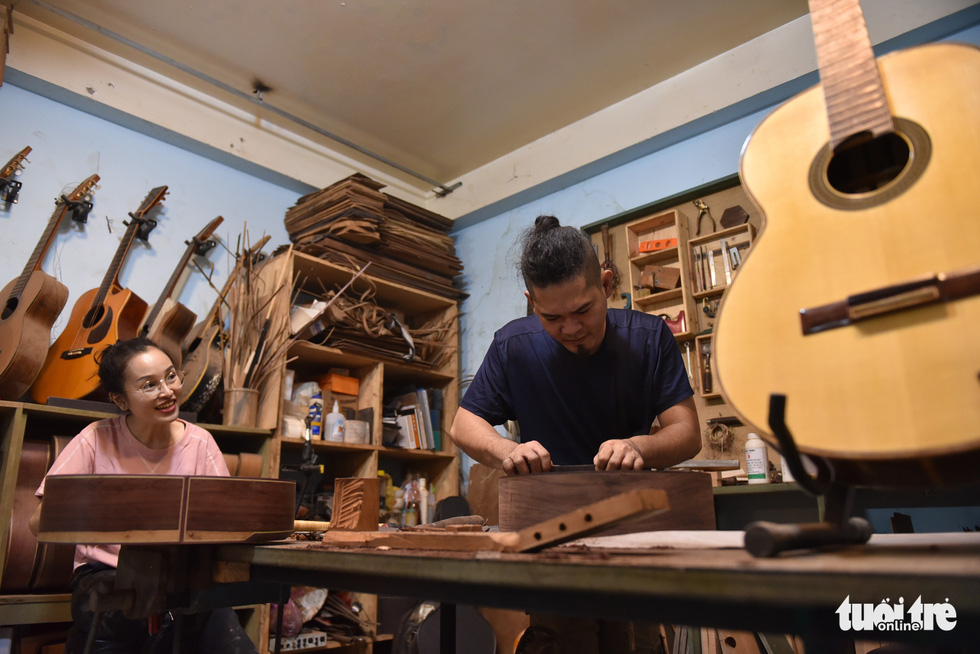 A couple’s custom guitar workshop outside of Ho Chi Minh City