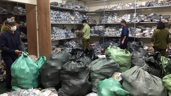 Hanoi police bust depot with over 3,000 pairs of fake designer shoes
