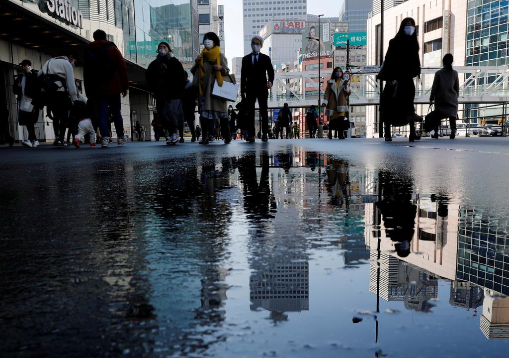 Japan business mood improves to pre-pandemic levels on global recovery hopes