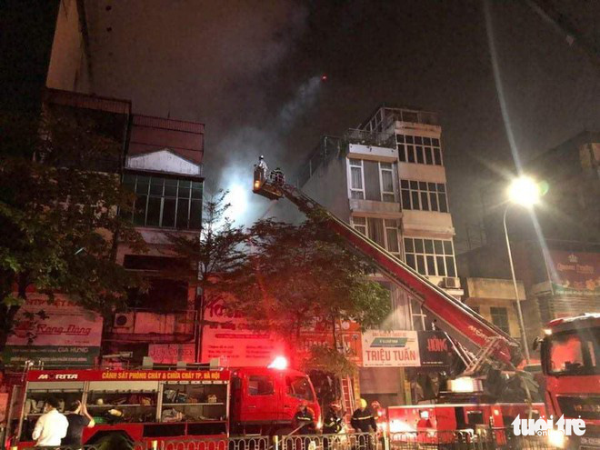 Four family members killed as fire engulfs baby store in Hanoi