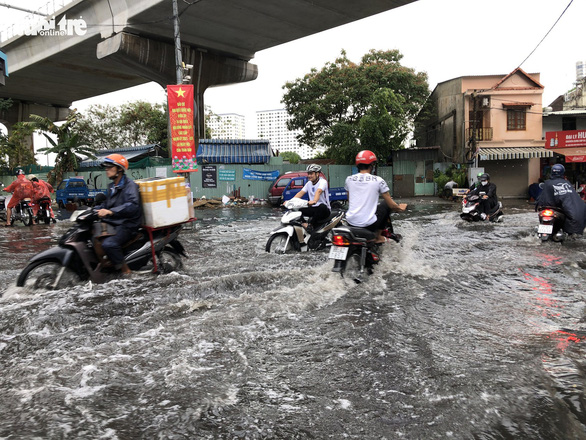 Ho Chi Minh City’s inundation flashpoint deep in floodwater after brief rain
