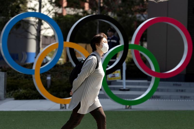Japan denies report of vaccine priority for Olympic athletes after outcry