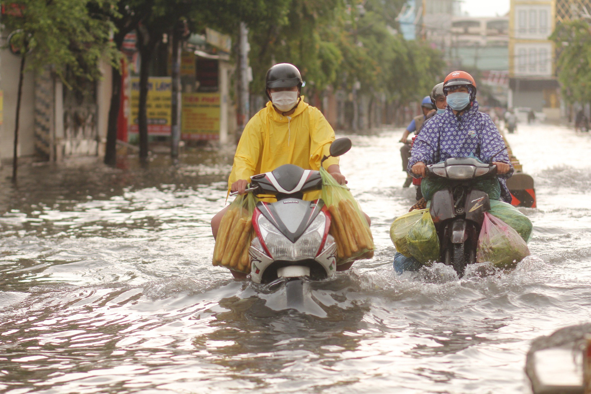 Early morning downpour sinks parts of Ho Chi Minh City