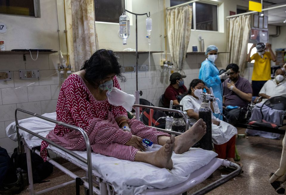 India's COVID-19 daily cases hold close to record, another state imposes lockdown