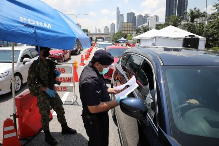 Malaysia declares nationwide lockdown as COVID-19 cases spike