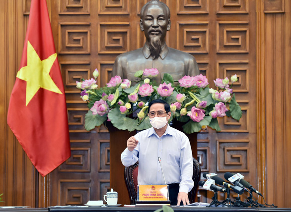 Vietnamese premier urges Pfizer vaccine purchase amid rapid virus transmission