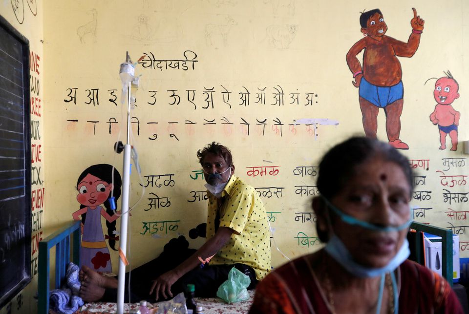 India's coronavirus infections ebb but states struggle for vaccines