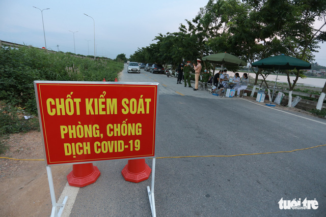 Northern Vietnamese city imposes curfew, sets up checkpoints as COVID-19 cases soar