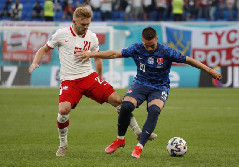 Soccer - Skriniar lifts Slovakia to 2-1 win over 10-man Poland