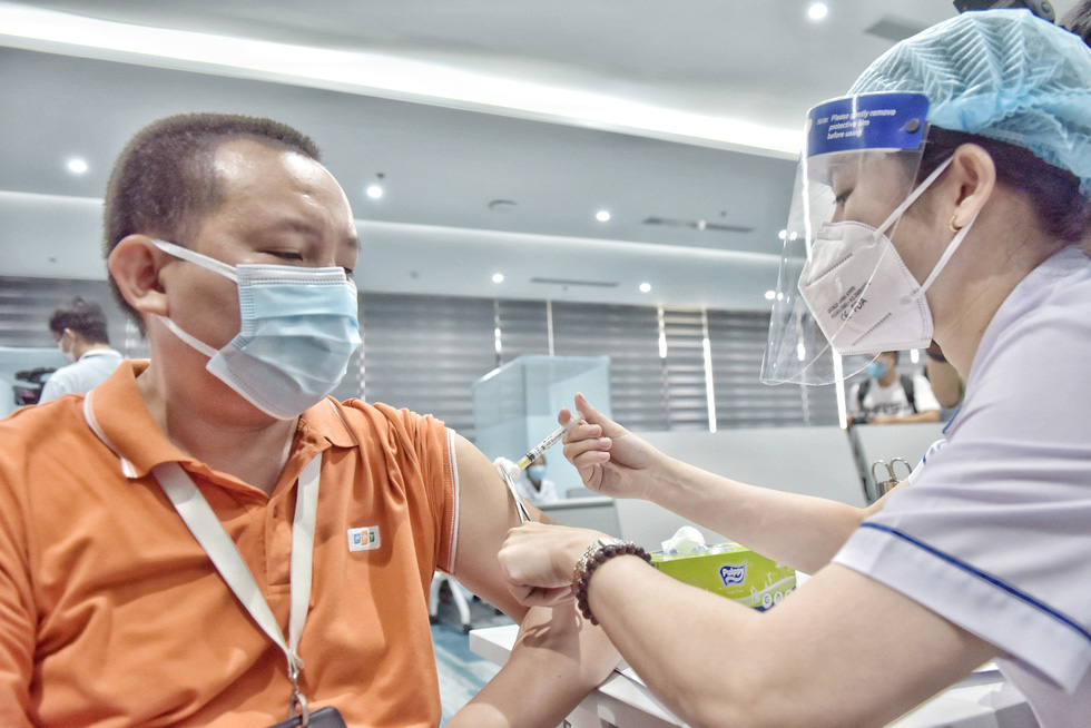 Ho Chi Minh City’s largest-ever COVID-19 vaccination drive starts with first doses for 500 workers