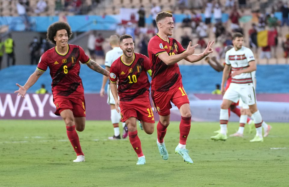 Hazard rocket fires Belgium past holders Portugal into last eight