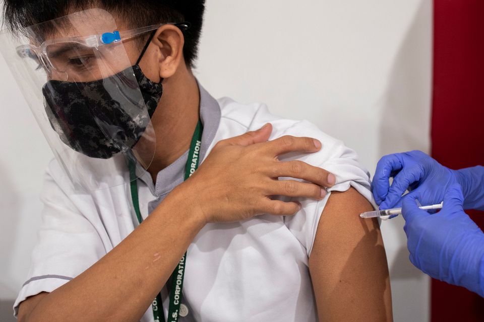 Philippines extends coronavirus curbs until mid-July
