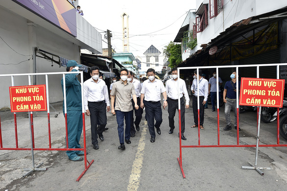 Ho Chi Minh City escalates COVID-19 social distancing by banning public gatherings of over two