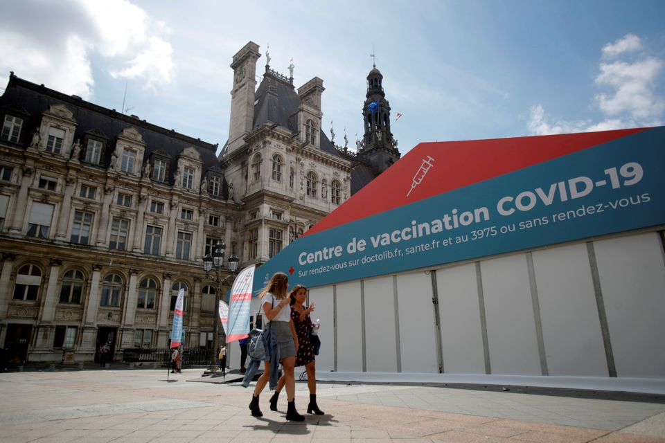 Rush for COVID vaccines as French government tightens screws