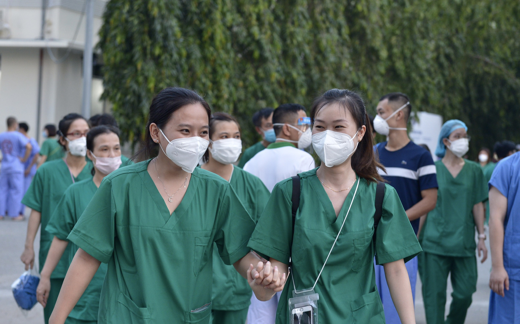 Vietnam inoculates over 500,000 people a day as daily infections rise