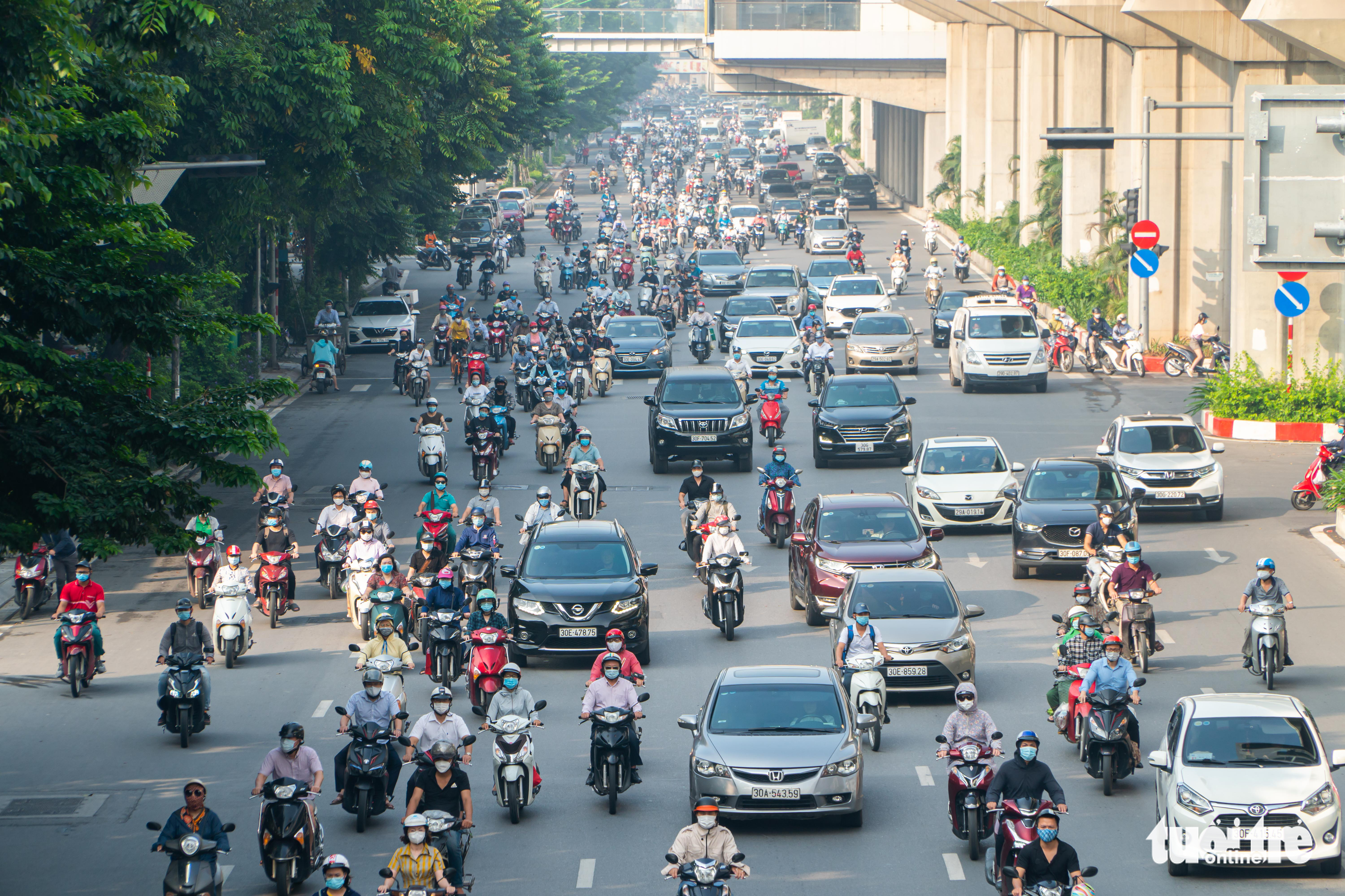 Hanoi streets bustling on first day after travel pass removal