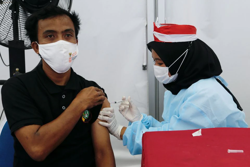 Indonesia to start COVID-19 boosters after 50% of public vaccinated