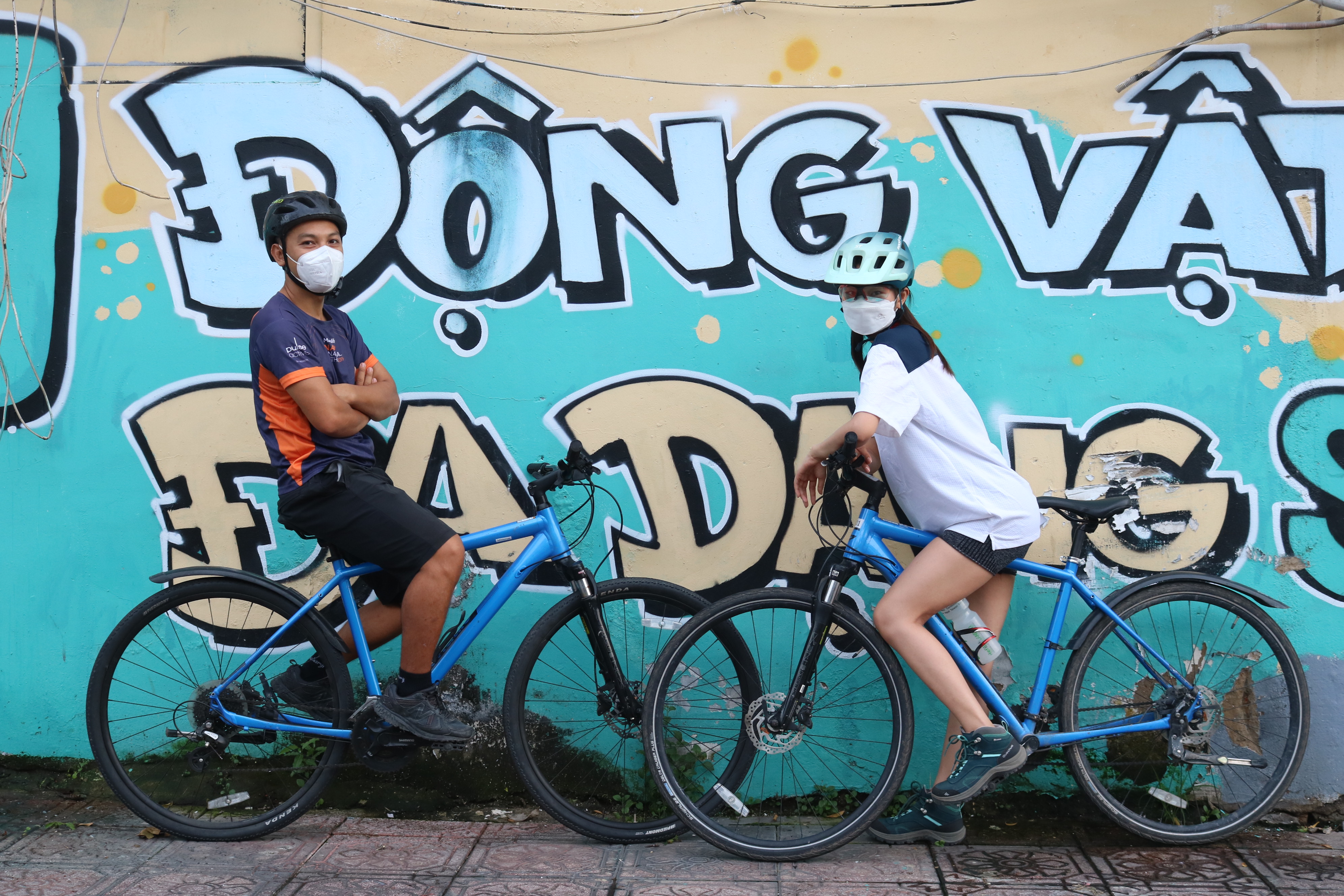 Saigonese cycle away their stress as COVID-19 restrictions ease