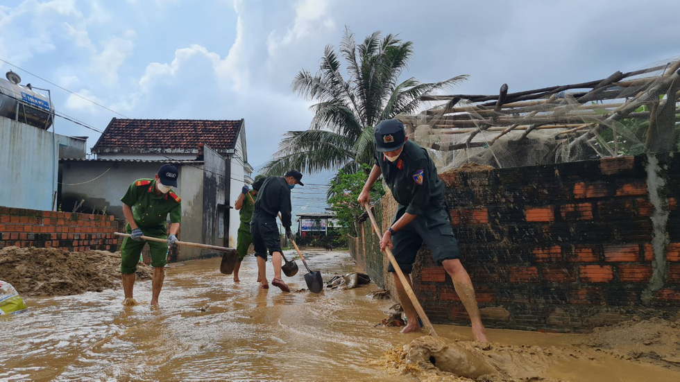 Hundreds clean up village enduring two landslides in south-central Vietnam