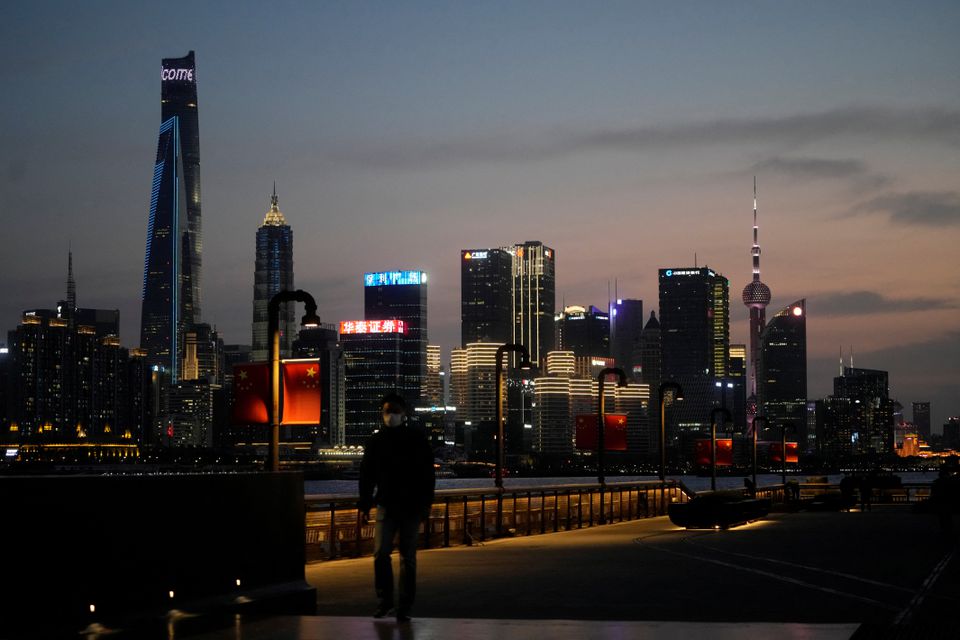 Shanghai expands lockdown to more areas as new local cases hit 5,982