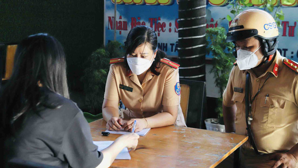 In Ho Chi Minh City, will beer stall owners be willing to report drunk diners to traffic police?