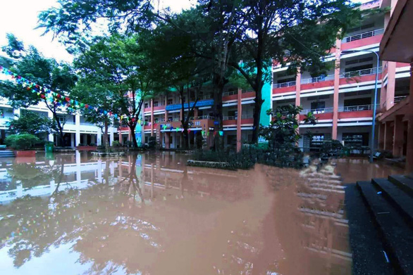 3,600 students off as school flooded with river water in Vietnam’s southern city